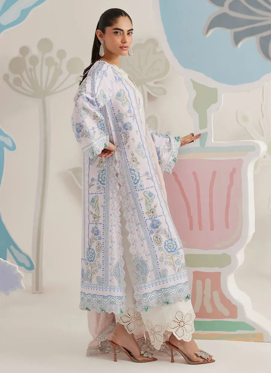 Woman wearing a floral dress with a colorful abstract background