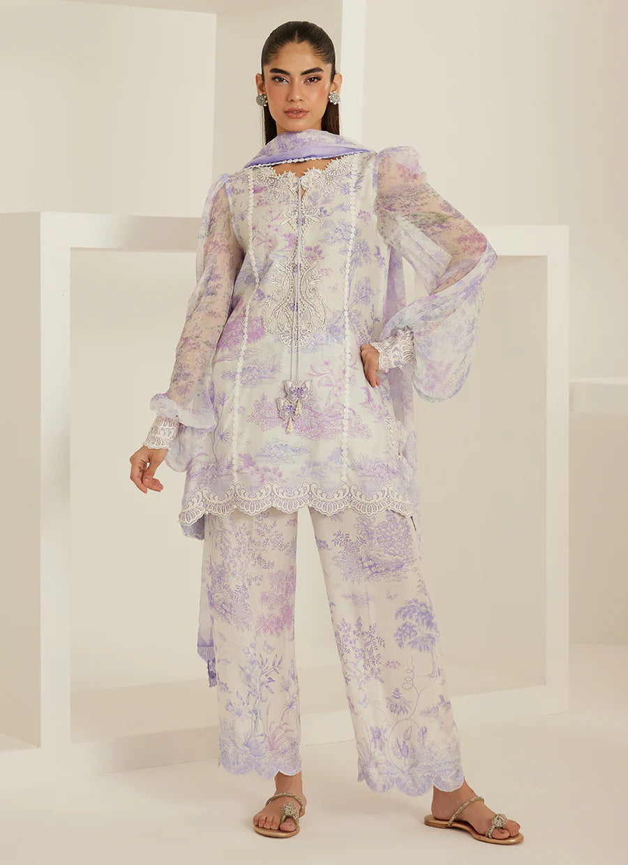 Woman wearing a floral outfit with a white background