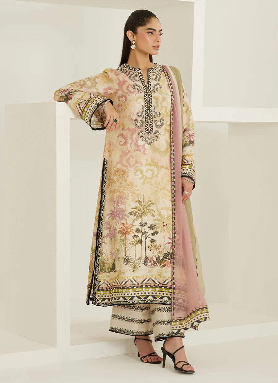 Woman wearing a traditional embroidered outfit with a neutral background