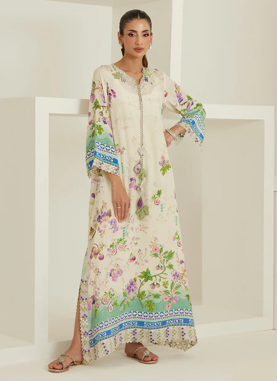 Woman wearing a floral dress with a brand logo on a white background