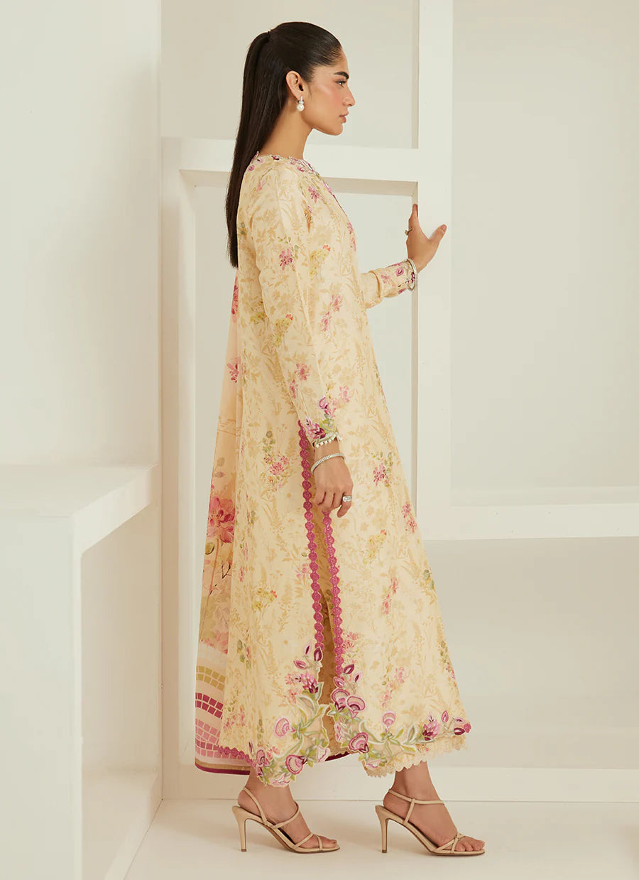 Woman wearing a floral dress in a minimal white room