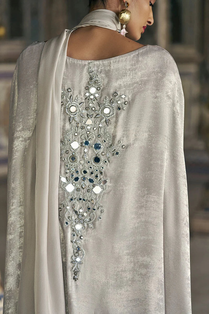 Silver embroidered garment with a blurred background