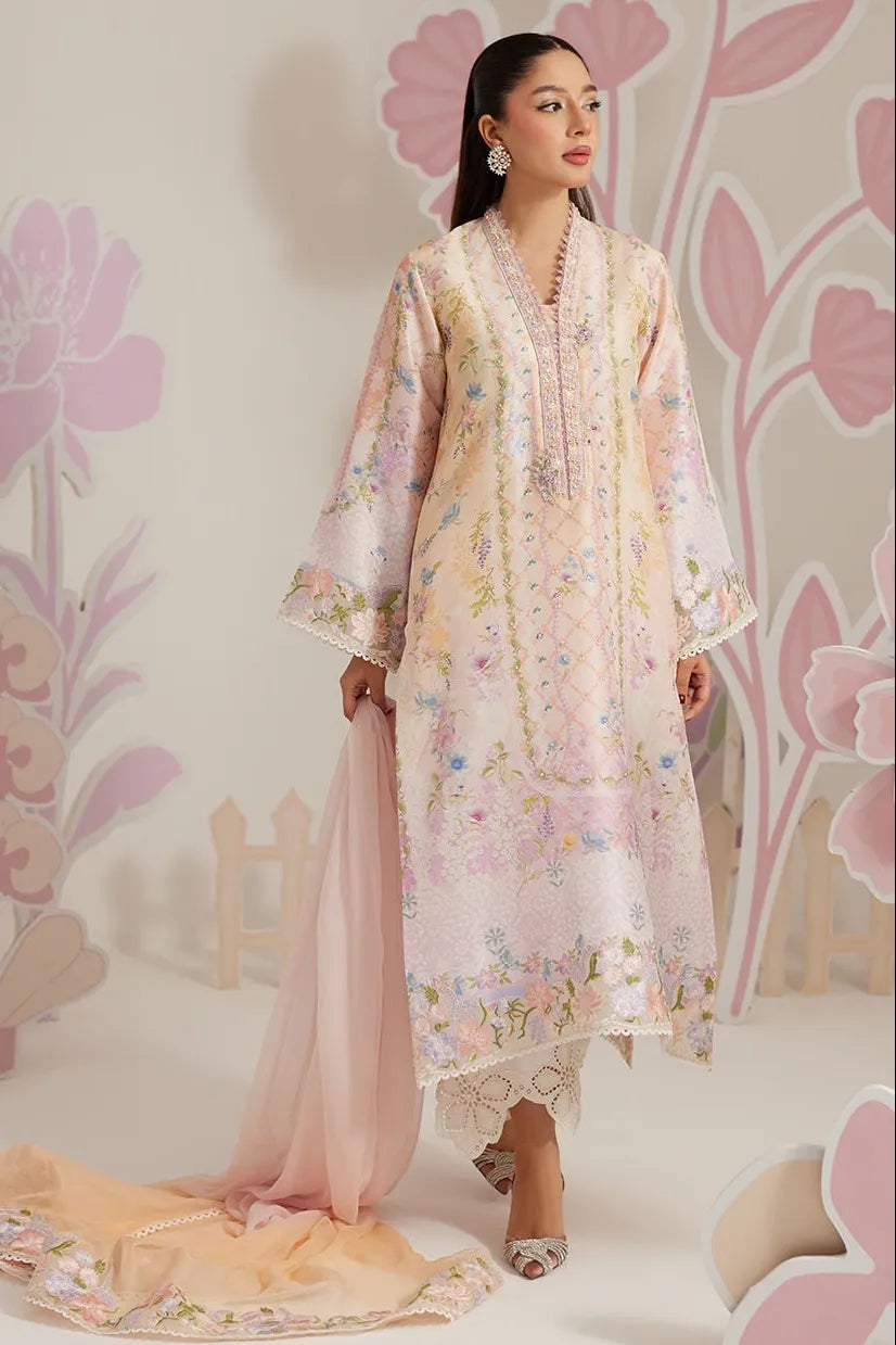 Woman wearing a floral dress with a pink background