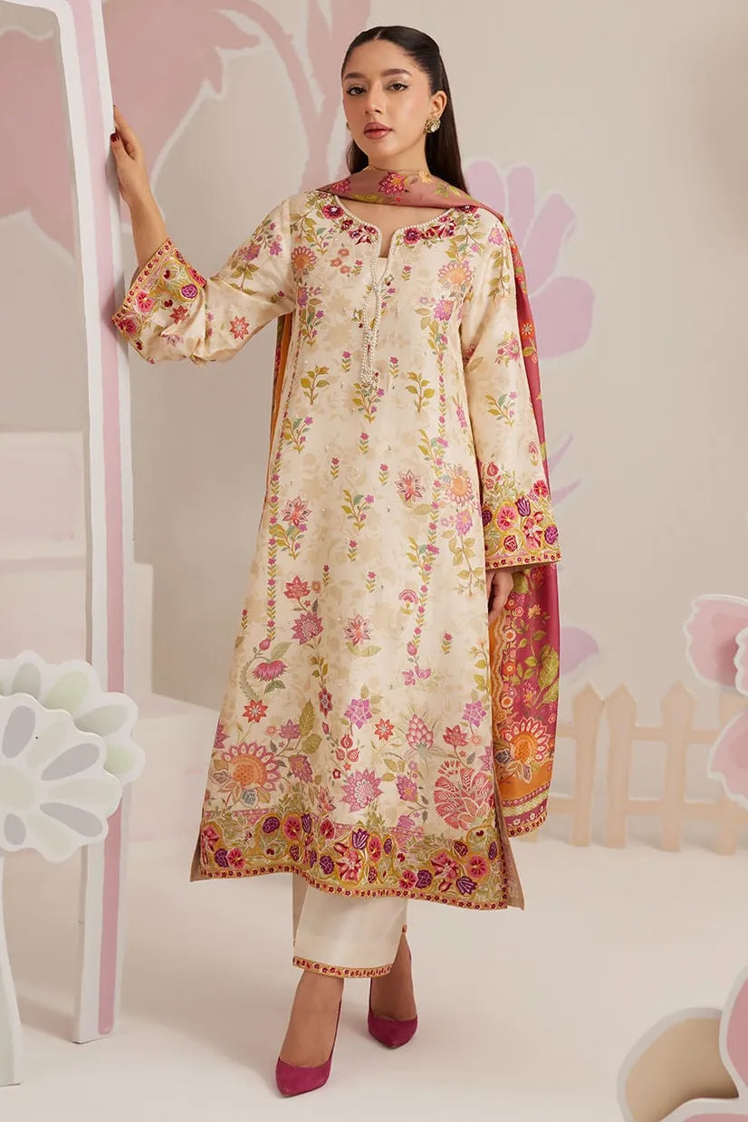 Woman wearing a floral dress with a matching dupatta against a light background