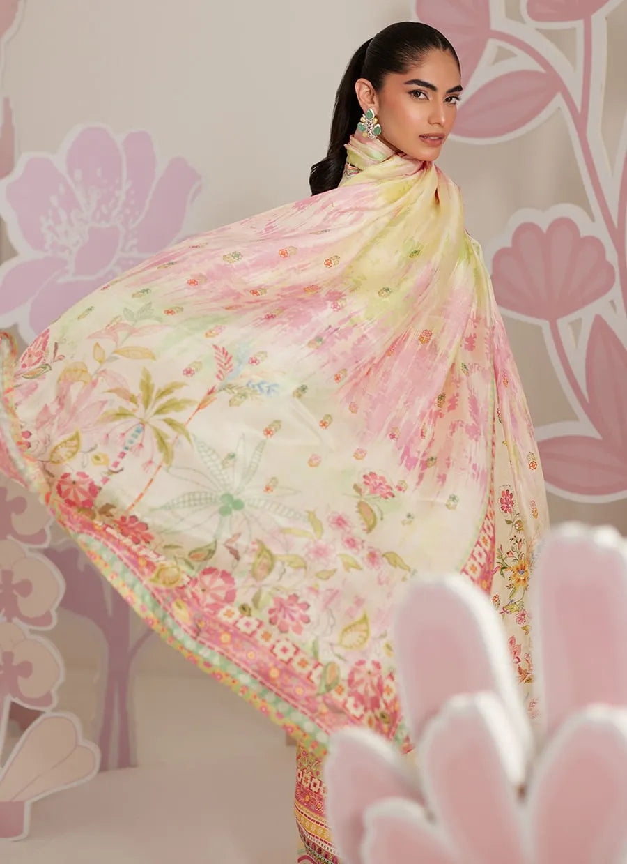 Woman wearing a floral saree with a decorative background